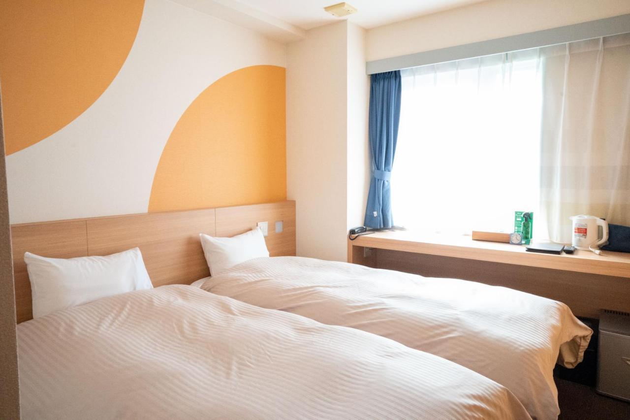 Hotel Raffinato Chitose Титосе Экстерьер фото